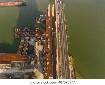 Construction Of The Bridge Across The River.  Aerial View.