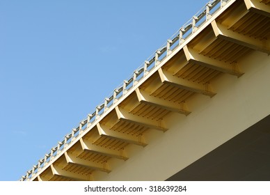 The construction bridge span on background of blue sky
