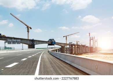 Construction of bridge under blue sky. - Powered by Shutterstock