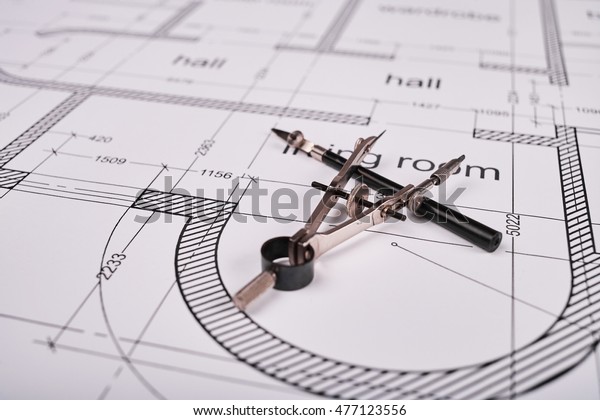 Construction of the building layout, building\
drawing on paper, a set of drawing\
tools.
