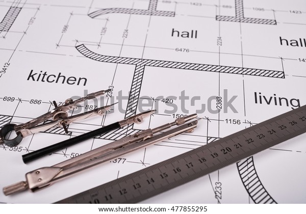 Construction of the\
building layout, building drawing on paper, a set of compasses for\
drawing of steel