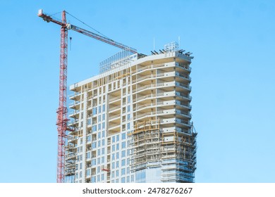 Construction Crane at Building Site - Concept of Modern Construction