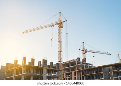 Construction crane on the background of the sky. Construction site. - Powered by Shutterstock