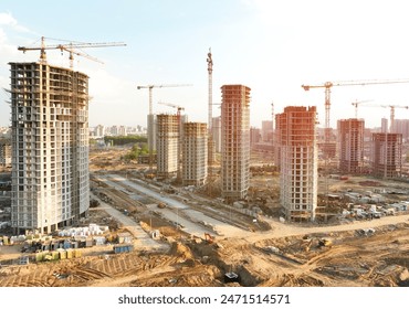 Construction crane on Housing. Construction site with buildings under construction. Tower cranes in action. Crane during formworks. Multi Storey Residential Buildings construction, aerial view. - Powered by Shutterstock