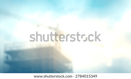 A construction crane is positioned above a building structure against a bright sky with a prominent lens flare effect.
