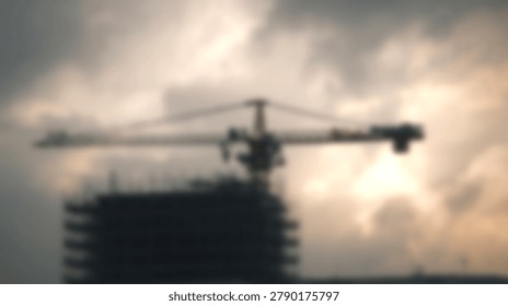 A construction crane silhouetted against a dramatic, cloudy sky during sunset. The image captures the essence of a building site.