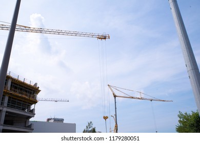 Construction Cranes at Dawn