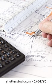 Construction Drawings on a table. (Changes in progress)