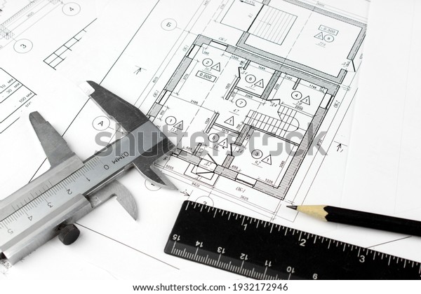 Construction drawings and plan tools. Close-up of\
Architect engineer drawing\
plan