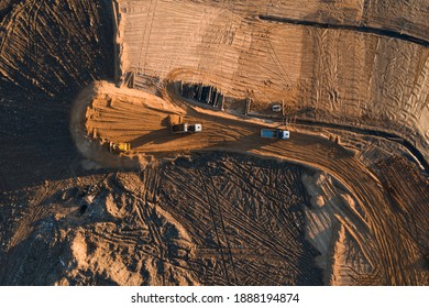 Construction of an embankment during the reclamation of a garbage dump - Shutterstock ID 1888194874