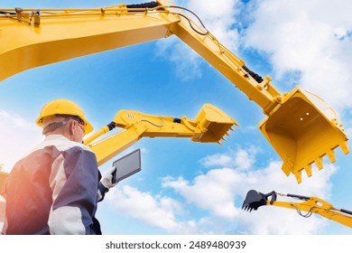 Construction engineer with computer tablet, industry mining banner. Industrial background with excavator and worker, sunlight.