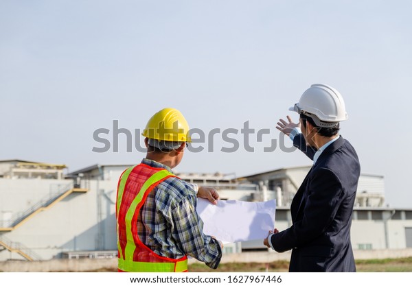 Construction Engineer Standing Conversation On Construction Stock Photo ...