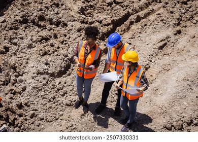 Construction engineer team discusses with architect at the construction site. or high-rise construction sites