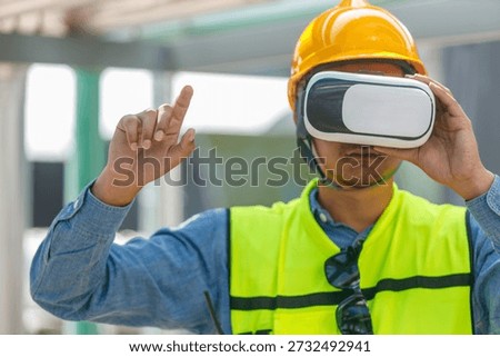 Construction engineer wearing VR headset and safety gear explores virtual simulation for industrial training and site planning. Concept of innovation, augmented reality, smart technology.