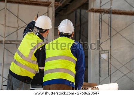 Construction engineer working at construction site