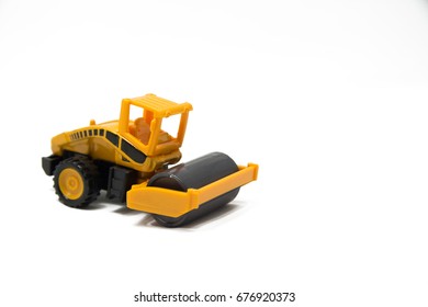 Construction Equipment Toys isolated on white. Road Roller.
