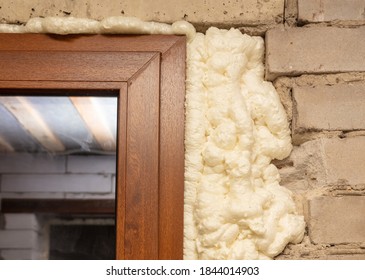 Construction Foam Between The Wall And The Door. Technology