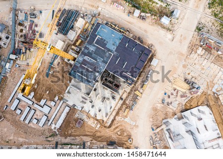 construction formwork in construction site. aerial topdown view of high-rise apartment building construction