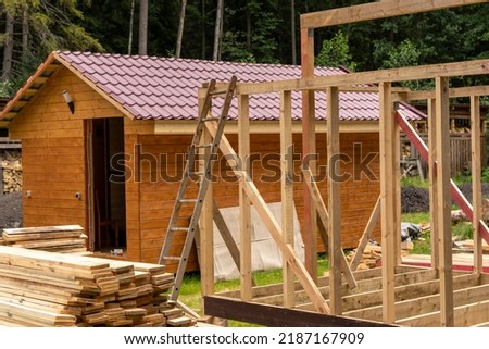 construction of a frame house. Timber frame house, new build roof 