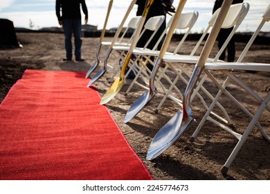 Construction ground breaking ceremony with red carpet - Shutterstock ID 2245774673