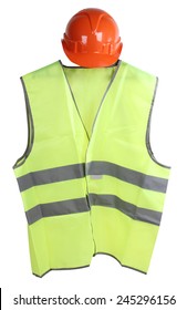 Construction hard hat and high visibility vest on a white background