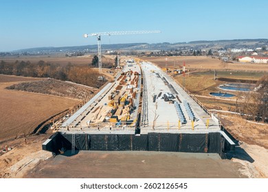 Construction of Highway D35, including the installation of a new concrete bridge.