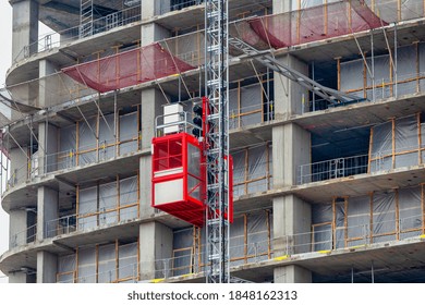 Construction hoists elevator for workers and material at the construction site.