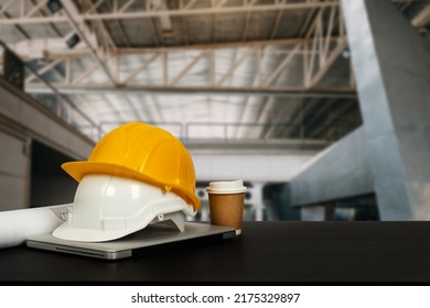 Construction House And Building. Repair Work. Dof Laptop Computer And Office Construction On Table In Office Blurred Background.Architect Concept.
