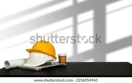 Construction house and building. Repair work. Dof laptop computer and office construction on table in modern office background.Architect concept.
