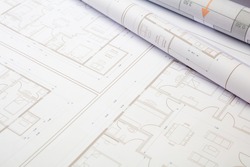 Construction housing project, real estate concept. Residential building blueprint plans, Architect engineer office desk, copy space, template, an Industrial Photo by rawf8