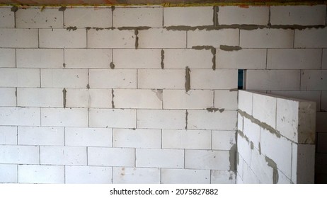 Construction Of Internal Partitions In The House. Fragment Of A Wall Made Of Plaster Blocks. Lightweight Materials For Interior Partitions. Close-up.