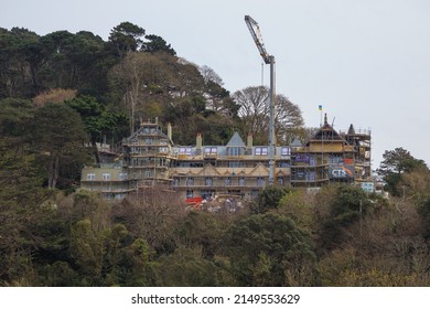 Construction of a large multi-storey building on a hill. Lynmouth, Devon, England, UK - 17 Apr 2022.