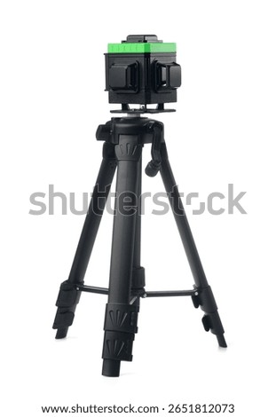 Construction laser level with tripod isolated on white