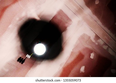 Construction light in front of grouted ceiling