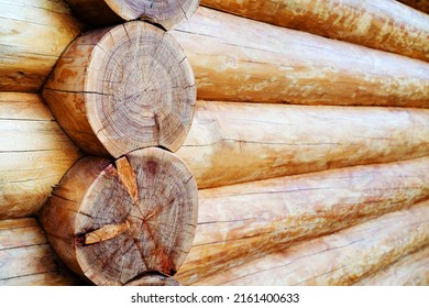 Construction of a log house. Fragment of logs installed according to ancient technologies. Close-up. selective focus