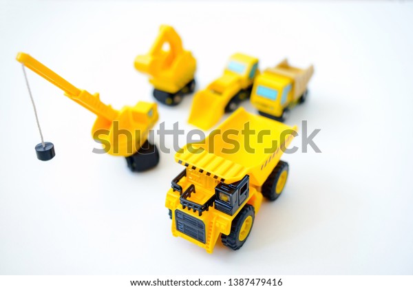 Construction\
machines, yellow toys, building\
machine
