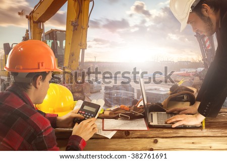 Construction manager on the construction site at sunset as a background Construction