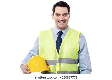 Construction manager posing with hardhat