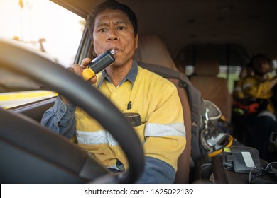 Construction Miner Worker Dressing Working Uniform Conducting Safety Seft Pre Alcohol Testing To Ensure 000 In Blood Alcohol Content While Driving On Site SYD, Australia