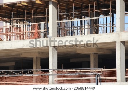 Construction of a modern building in close-up. Scaffolding