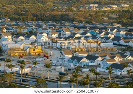 Construction in new developing suburban area. Development of residential housing in American suburbs. Real estate market in the USA