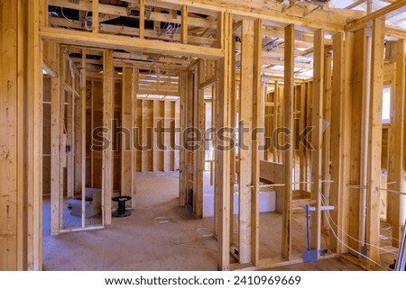 Construction of new home beams stick trusses framing