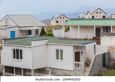 Construction of new houses in mountainous areas - Shutterstock ID 1849442650