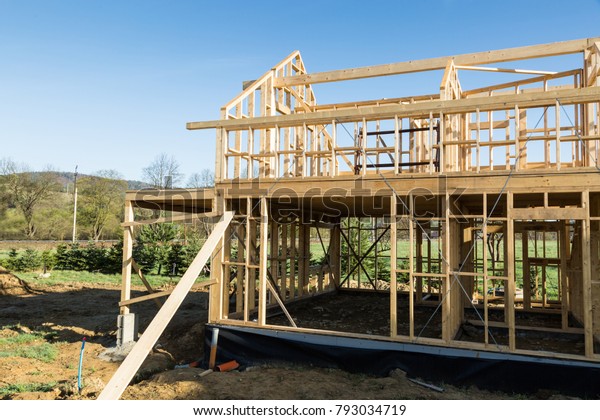 construction-new-wooden-house-skeleton-600w-793034719.jpg