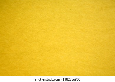 Construction Paper. Macro Shot Or Extreme Close Up Of Colored Construction Paper, Showing Texture, Fibers, Flaws, And More. Yellow Construction Paper. Backgrounds, Wallpapers And Textures. 
