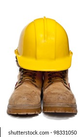 Construction PPE - Steel Toe Boots And A Yellow Hard Hat