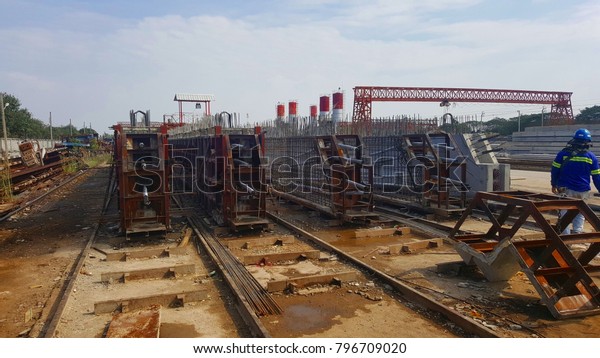 Construction precast\
concrete beam in factory construction at site and stock\
yards,concrete reinforced\
beams.