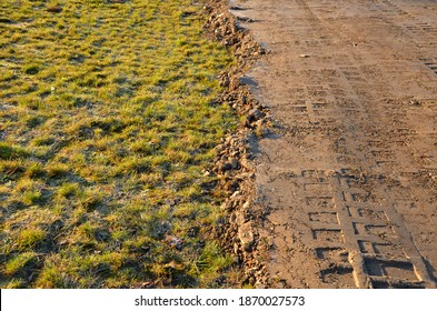 construction preparation by leveling and soil compaction by vibrating rollers and point plates. dredging and overburden in the place where the lawn grew leveling, planting, ground body, trunk, push, p