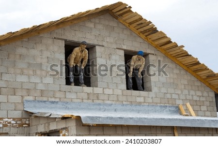 construction of a private house from silicate blocks on a summer cottage on an autumn day