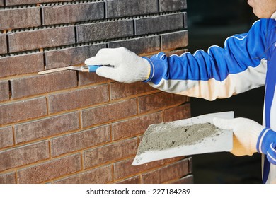 Construction Process Of Bricklaying Using The Brick Jointer Trowel 